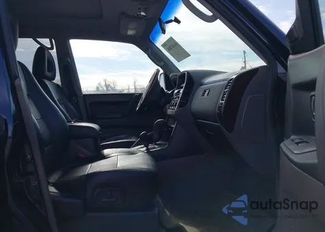 2002 Mitsubishi Montero Limited z USA, uszkodzony, nr VIN JA4MW51R92J003139